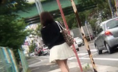 Asian Pee Slut Urinates On The Street