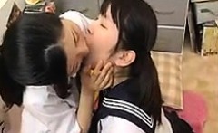 Two Asian lesbian schoolgirls make out before they go for p