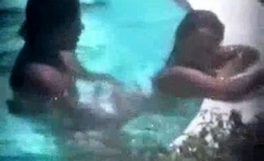Hot brunette caught fucking in the hotel pool by a peeper