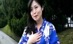 Wild japanese brunette plays with two cocks