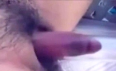a woman pumps her clit into a dick
