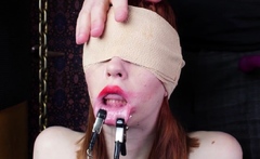 Blindfolded sub gagging